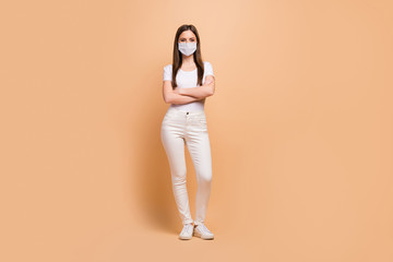 Obraz premium Full size photo of charming attractive girl cross hands spring free time, working day rest relax wear good look outfit shoes isolated over beige color background