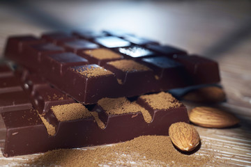 Chocolate with nuts close-up narrow zone of sharpness