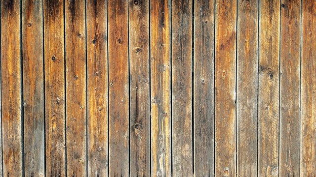 Background of aged parallel wooden planks