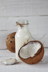 Ripe coconuts with on light wooden table