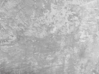 gray rough cement or concrete floor. Loft style wall.