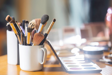 Blush brush and make-up tools on the table