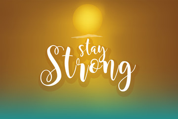 Stay Strong text with sunrise or sunset background.