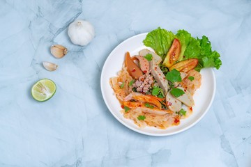 yam wun sen, Glass noodle spicy salad with Thai pork sausage ,mix vegetables,mushrooms, carrots,onions,minced pork and chilly in Thailand it call “Yam moo yo” Popular and famous food in Thai.