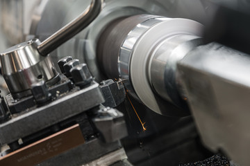 Metalworking lathe milling machine. Cutting metal modern processing technology. Milling is the process of machining using rotary cutters to remove material by advancing a cutter in workpiece.