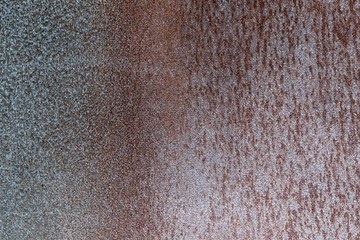 Close-up Detail of Orange Weathered and Textured Steel with Green Patina