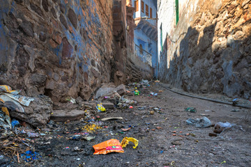 07/02/2020 India, Jodhpur,.a lot of dirt and trash on the street of the blue city in Rajasthan. scenic street life of colorful India. environmental pollution problem