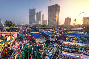 .Dhobi Ghat also known as Mahalaxmi Dhobi Ghat is the largest open air laundromat in Mumbai. one of the most recognizable landmarks and tourist attractions of Mumbai - obrazy, fototapety, plakaty