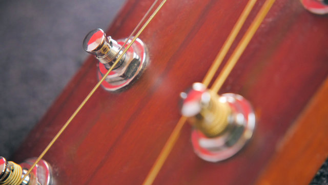 Closeup wooden guitar tuners, high resolution
