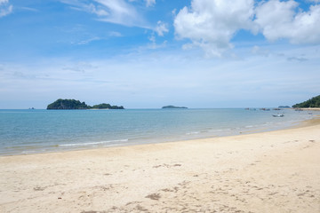 Fototapeta na wymiar View of seascape is sand beach and view island and blue sky at thailand