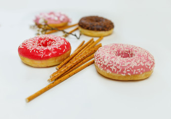 colored donuts on a light background