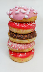 donuts stacked on a light background