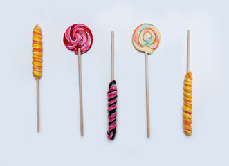 colored lollipops on a light background