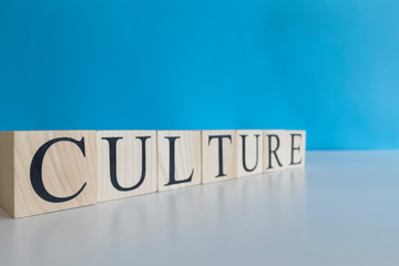 Culture text on wooden cubes. Close-up and blurred background. Studio