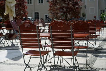 Benches and chairs at tables invite you to relax and unwind