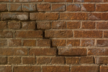 old, frayed yellow brick wall texture, background. copy space