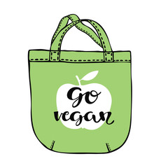 Hand drawn bag with apple and lettering go vegan. Healthy food concept. 