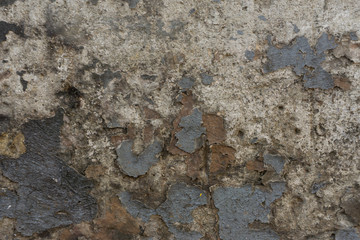 old cracked brown paint on a door with white gaps. texture, background