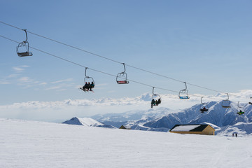 Fototapeta na wymiar People climb the ski lift of Gudauri