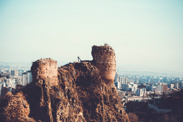 Narikala Fortress against the backdrop of New build buildings in Tbilisi