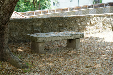 Benches and chairs at tables invite you to relax and unwind