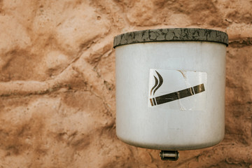 Smoking label with cigarette on an ashtray