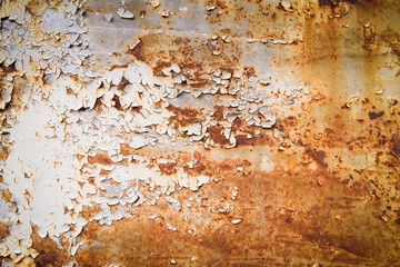 old cracked brown paint on a door with white gaps. texture, background. copy space