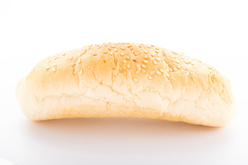 White dough bun with sesame seeds. Bun for breakfast.
