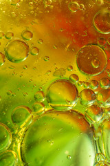 macro photo of bubbles by the mix of oil and water