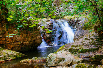 River Alba Trail. The trail then runs between high vertical walls bordering a fast-flowing stream with a succession of waterfalls, rapids and pools.  Redes Natural Park and Biosphere Reserve.  © MRMPhoto