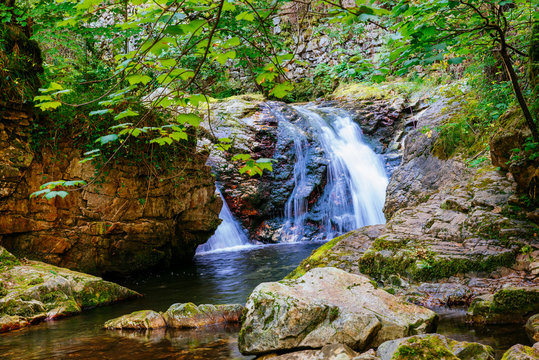 River Alba Trail. The trail then runs between high vertical walls bordering a fast-flowing stream with a succession of waterfalls, rapids and pools.  Redes Natural Park and Biosphere Reserve. 