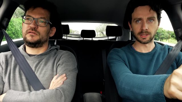 Two unhappy angry man fighting in car after end of quarantine coronavirus