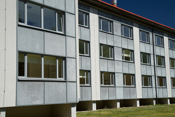 Muraste / Estonia - May 23 2020: Three storey simple block house. Exterior of the Estonian Academy...