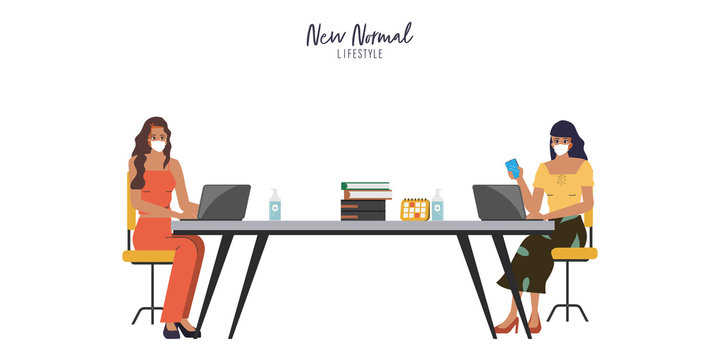 Business office people maintain social distancing meeting room and co working space. Stop covid-19 coronavirus. New normal lifestyle in job.