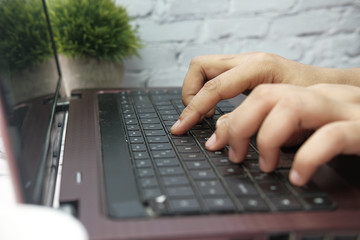  high angle view of person hand typing on keyboard 