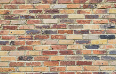 texture of the wall of colored bricks. brickwork