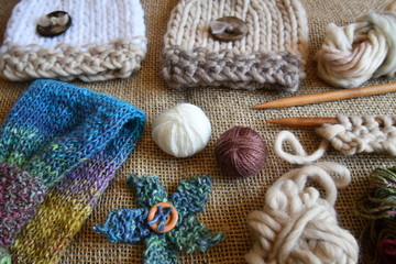 knitting and wool rustic project lay out with needles and wool