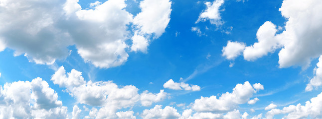 Naklejka na ściany i meble blue sky with clouds background panorama landscape. Wide panoramic view of cloudscape in daylight. Natural color of skies. Nature wallpaper