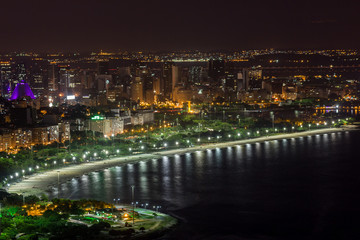 flamengo beach at night seen from the top of Urca Hill In Rio de Janeiro.