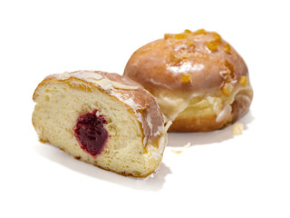 Half donut with, jam on a white background.