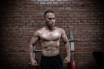 Portrait of asian man big muscle at the gym,Thailand people,Workout for good healthy,Body weight training,Fitness at the gym concept