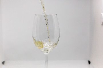 Wine falling into a cup, with space to write in