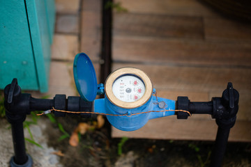 Blue water meter,  black tube and valve,new is open