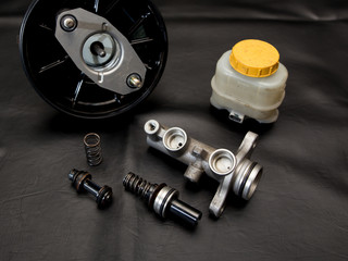 Master cylinder Brake set on black leather