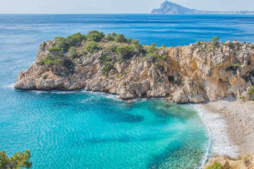 Calm Mediterranean sea and coast. Mascarat, Valencia, Spain