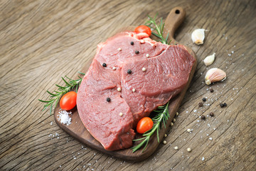 raw meat with ingredient in cooking steak on wooden table 