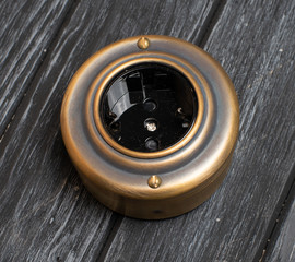 old-style power strip, light switch, scuffs and scratches