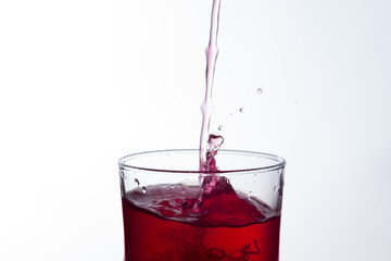 water falling into a clear glass