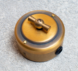 old-style power strip, light switch, scuffs and scratches