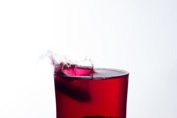 water falling into a clear glass